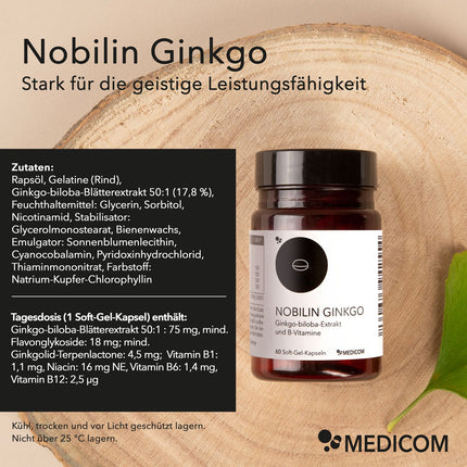 Die Produktdose von Nobilin Ginkgo auf einem Holztablett mit Produktinformationen, dazu gehören die genaue Angabe der Zutaten und was eine Tagesdosis (1 Soft-Gel-Kapsel) enthält. Informationen zur Aufbewahrung des Produktes