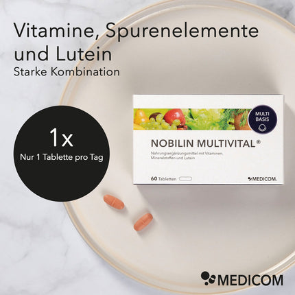 Die Produktpackung von Nobilin Multivital® mit zwei Tabletten auf einem Teller und ein Störer mit der Angabe der Tagesdosis: 1 x 1 Tablette pro Tag